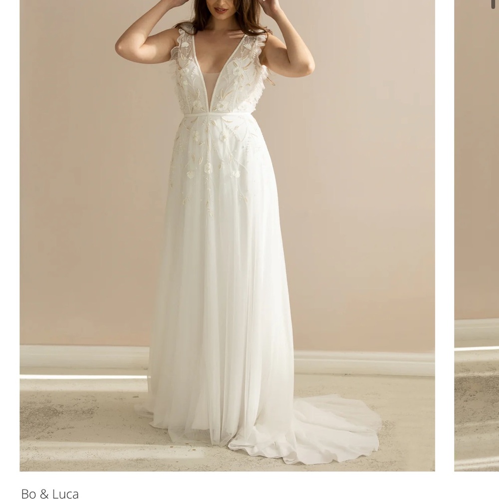 Bo and Luca size 8 Taylor gown. Purchased at sample sale, doesn’t fit properly.